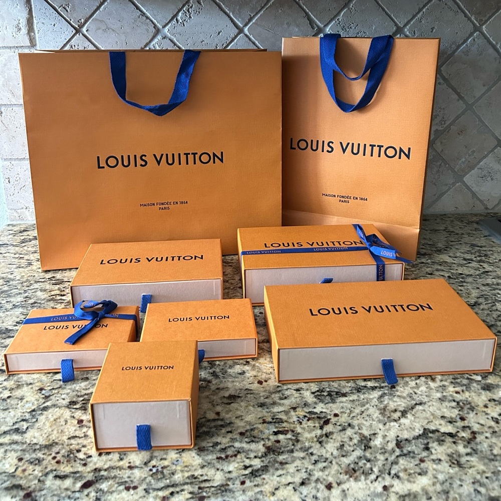 Louis Vuitton shopping bags, gift boxes & ribbons.